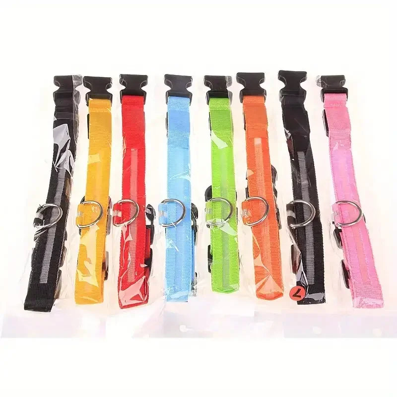 Assorted colored pet collars with metal rings displayed in a row on GEO store homepage