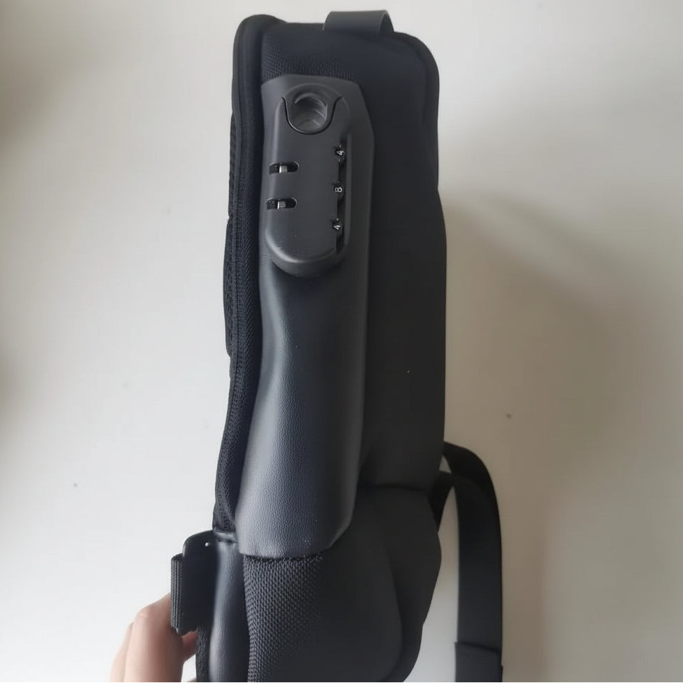 Black backpack side view with combination lock, HOMEFISH logo, on white background
